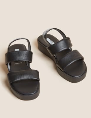 black strap flatforms