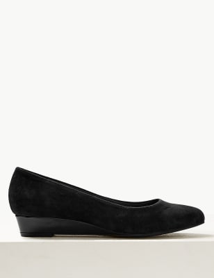 flat mules with tassels