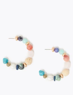 Open oorringen met meerdere kralen