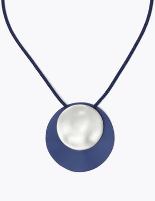 Setje van ketting en oorbellen met golvend motief en cirkels