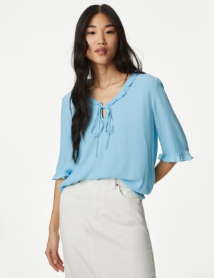 Blusa con volante en el escote hot sale