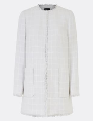 Openvallende overjas van tweed