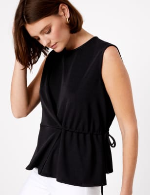 Mouwloze blouse met striksluiting