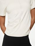 Yoga-T-shirt met lage ronde hals en wikkelstijl voorop