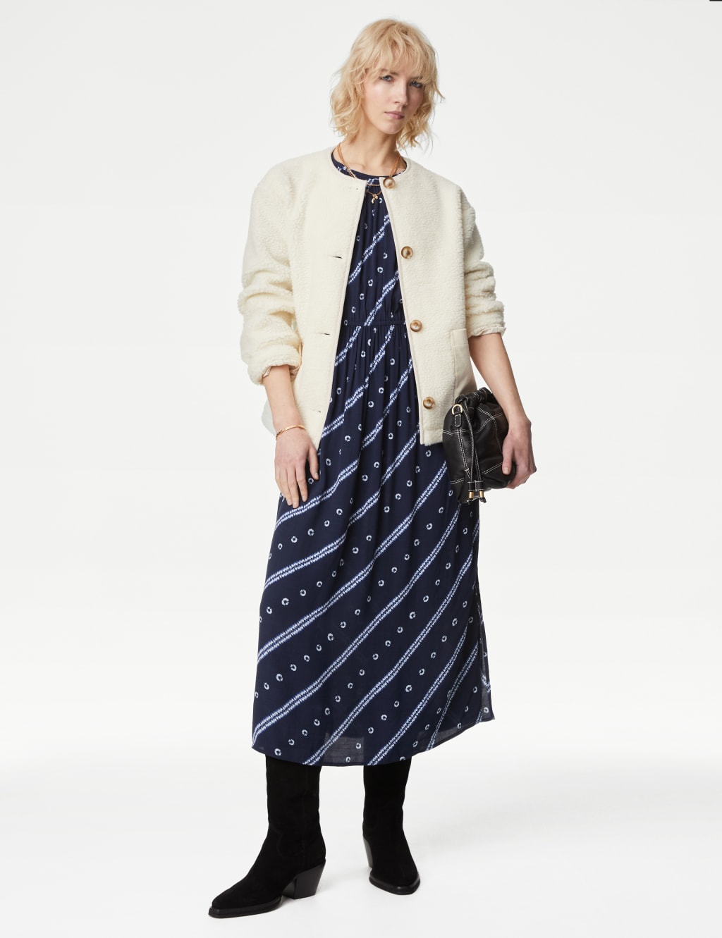 Per una coats and jackets online