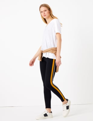 black leggings with yellow stripe down the side