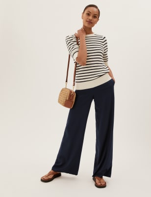 Irregular high-waisted wide-leg trousers