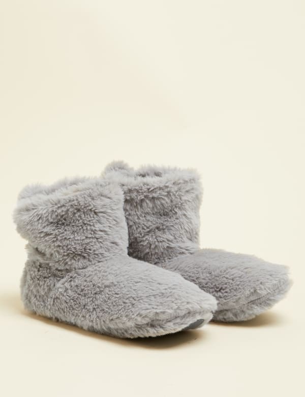 Faux Fur Pom Bootie Slipper Socks M S Collection M S We suggest sizing up to the next size if you have a wider foot, or are between sizes. faux fur pom bootie slipper socks m s
