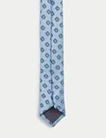Wąski krawat z geometrycznym wzorem