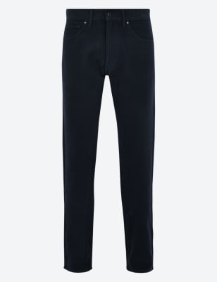 high waisted jeans and sneakers