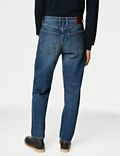 Volné džíny se sepraným vzhledem ve vintage stylu a&nbsp;mírně zúženými nohavicemi