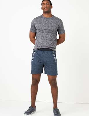 Short de sport &agrave; poche zipp&eacute;es