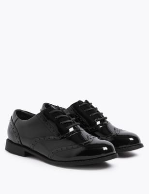 childrens plain black trainers