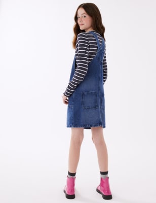 A denim pinafore for all the low-key style of your favorite jeans