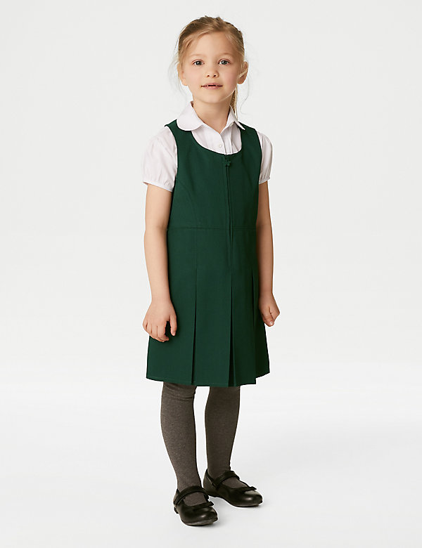 Schulschürzenkleid mit dauerhaften Falten (2–12 Jahre) - DE