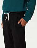 Volné kalhoty chino s&nbsp;vysokým podílem bavlny a&nbsp;elastickým pasem (6–16&nbsp;let)
