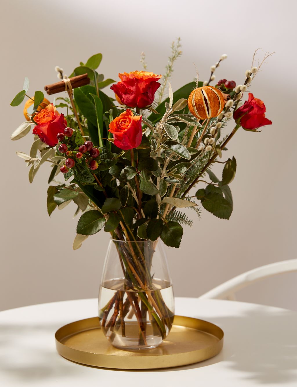 Orange Rose & Festive Foliage Bouquet