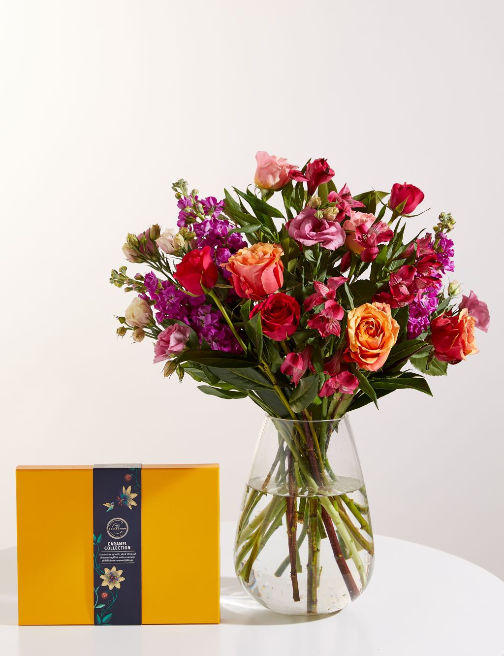 Roses, Iris & Stock Bright Bouquet with Collection Caramel Chocolates
