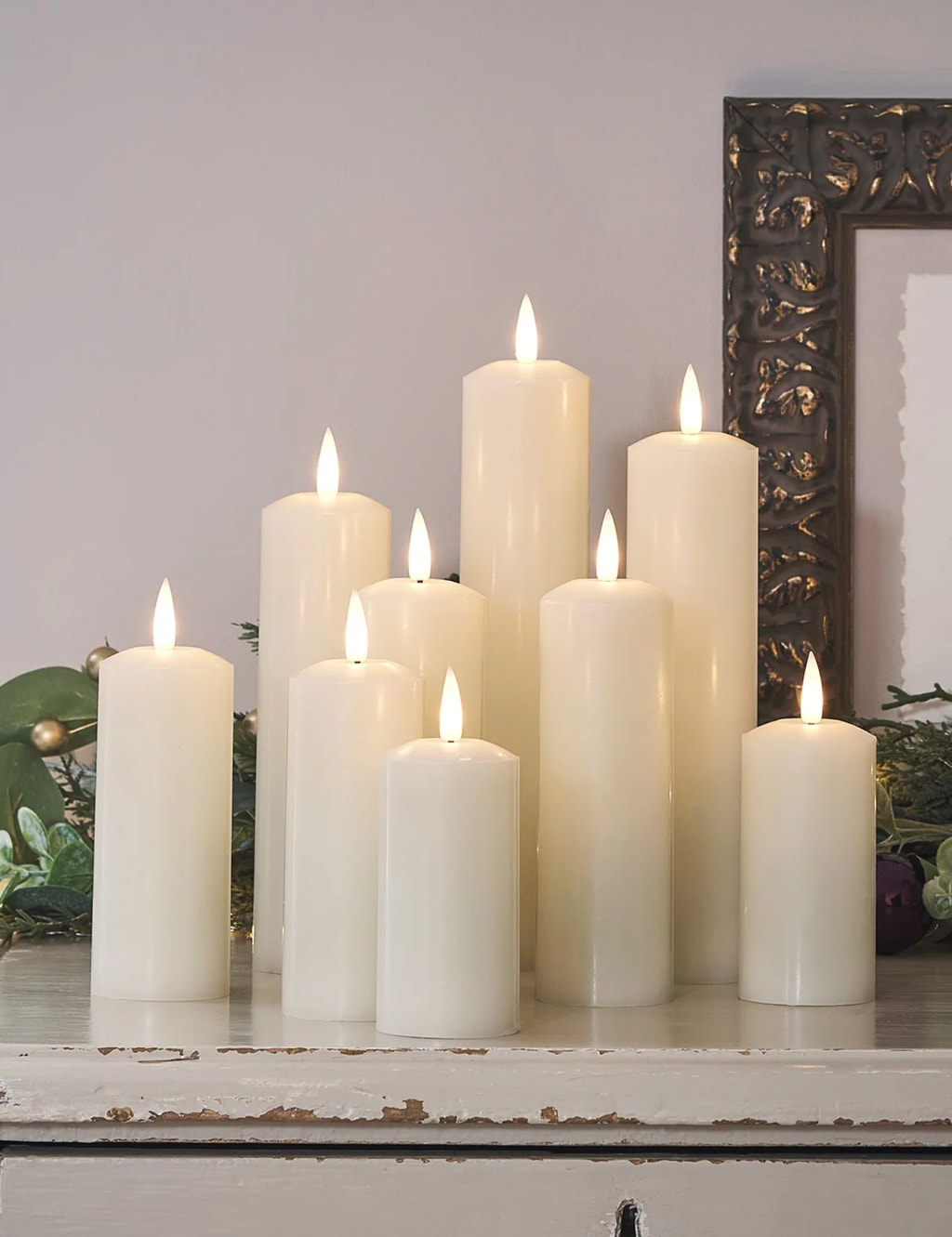 Set of 9 TruGlow® Slim Pillar LED Candles Lights4fun M&S