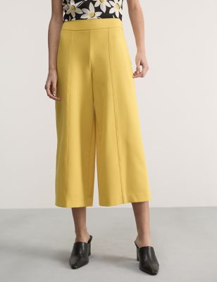 Yellow Front Skirt Back Pants, Women's Fashion, Bottoms, Skirts on Carousell