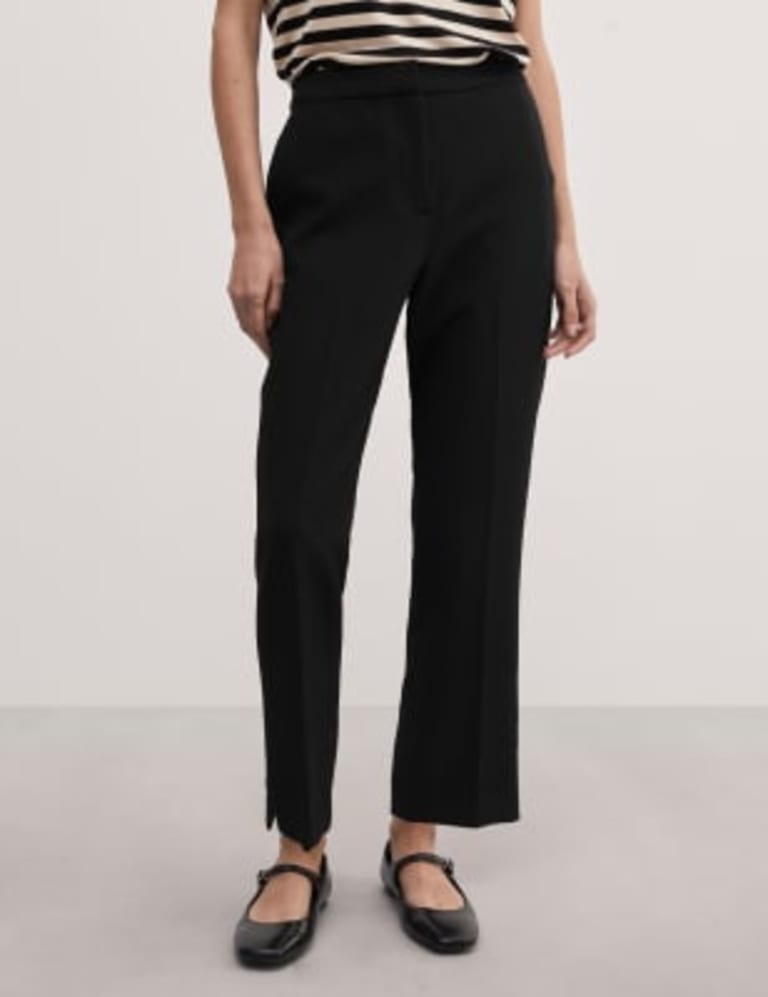 Black stretch slim leg trousers store