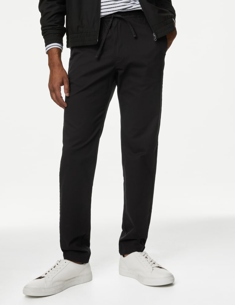 Tapered cut trousers store