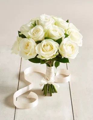 Bride Holding Wedding Flower Bouquet Of White Roses Stock Photo Alamy