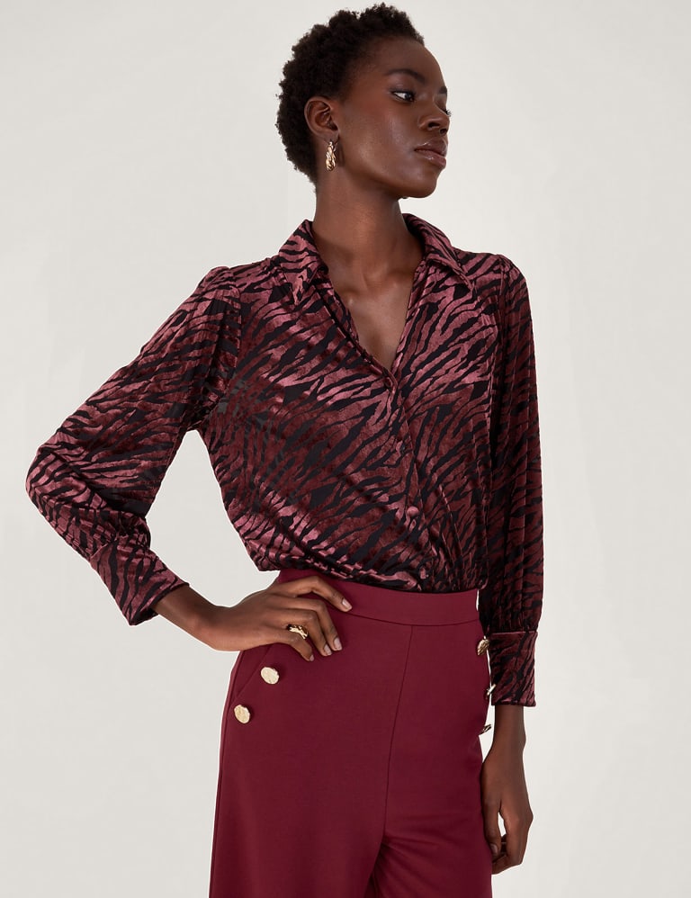 Animal print hotsell blouse red