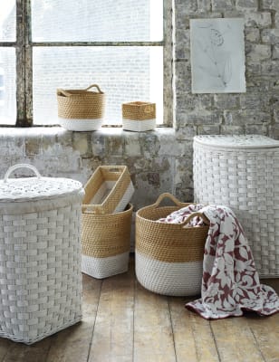 White Rattan Corner Laundry Bin M S For most people, a laundry basket is a purely utilitarian object that spends most of its time hidden away in a bedroom closet or laundry room.