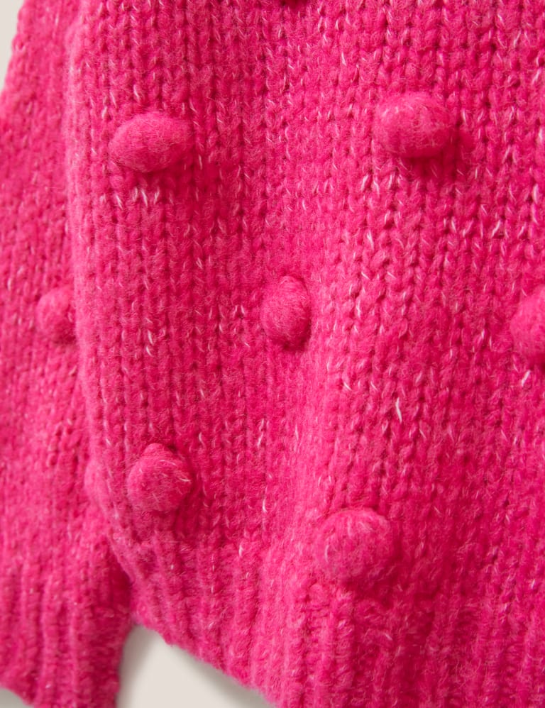 Pink pom pom jumper top
