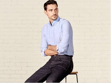 Man wears denim jeans