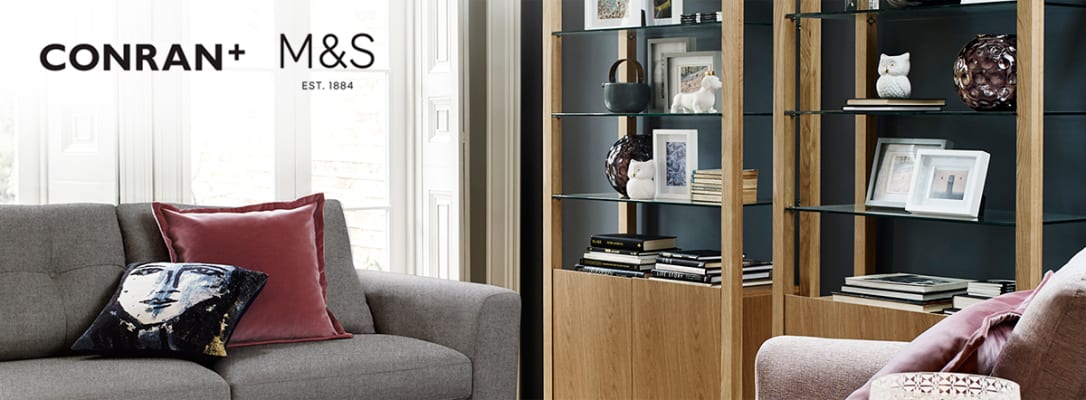 Stylish front room with wooden shelving and sofas