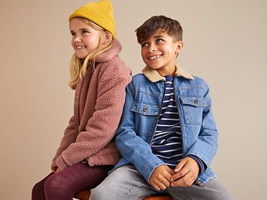 Girl and boy wearing M&S kidswear