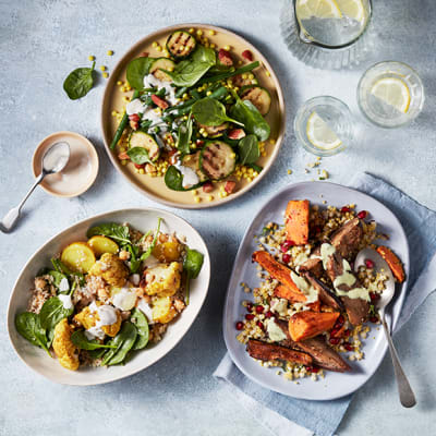 Trio of fresh salads: aubergine and sweet potato, turmeric-spiced cauliflower and potato, and chargrilled courgette and green bean