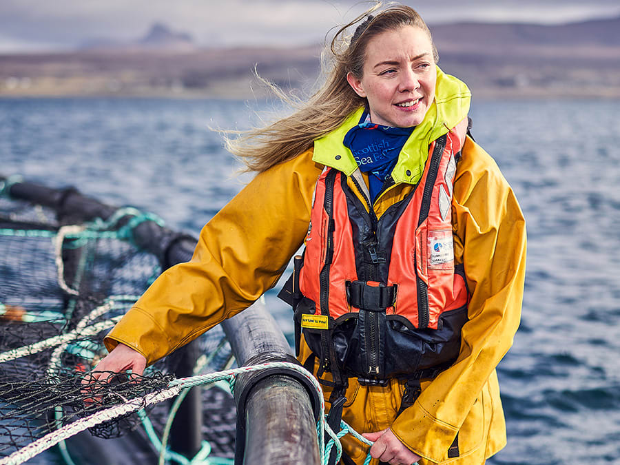 Fisherwoman in a dingy. Find out more about our fish